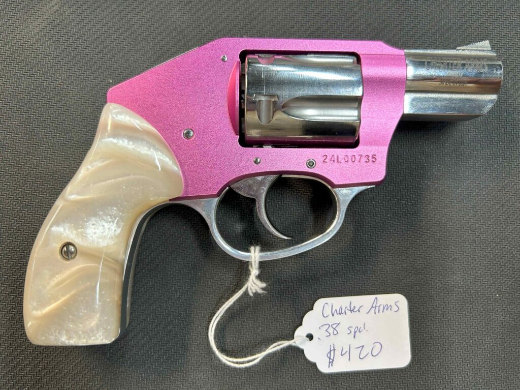 Charter Arms' takes aim at the female market segment with a variation of their popular .38 Special Undercover Lite. The Pink Lady offers the same durability, power and lighter weight as its predecessor, but with a unique and attractive pink finish Tough, aircraft-grade aluminum allows the Pink Lady to offer rugged reliability and power, while weighing in at a mere 12 oz. This compact, ultra-lightweight, five-shot, .38 Special revolver features a 2” barrel, fixed sights, and traditional spurred hammer. Like all Charter revolvers, the Pink Lady has a three-point cylinder lock. Model: 53830 Finish: 2-Tone: Pink & Stainless Frame: 7075 Aluminum Grip: Standard Barrel length: 2" Capacity: 5-shot Caliber: .38 Special Hammer: Standard Weight: 12 oz.